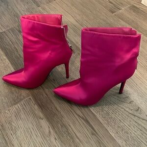Hot pink heeled boots